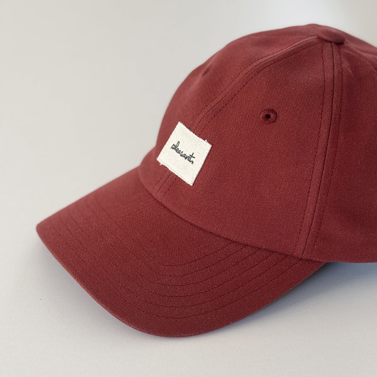 Upcycled cap, dark red