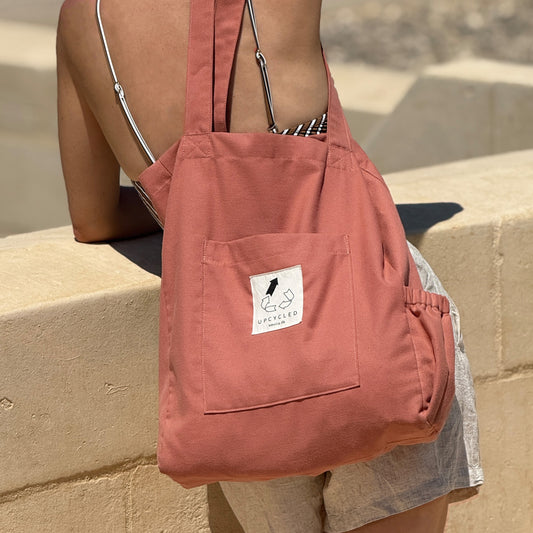 Upcycled mulepose med flaskeholder, koral