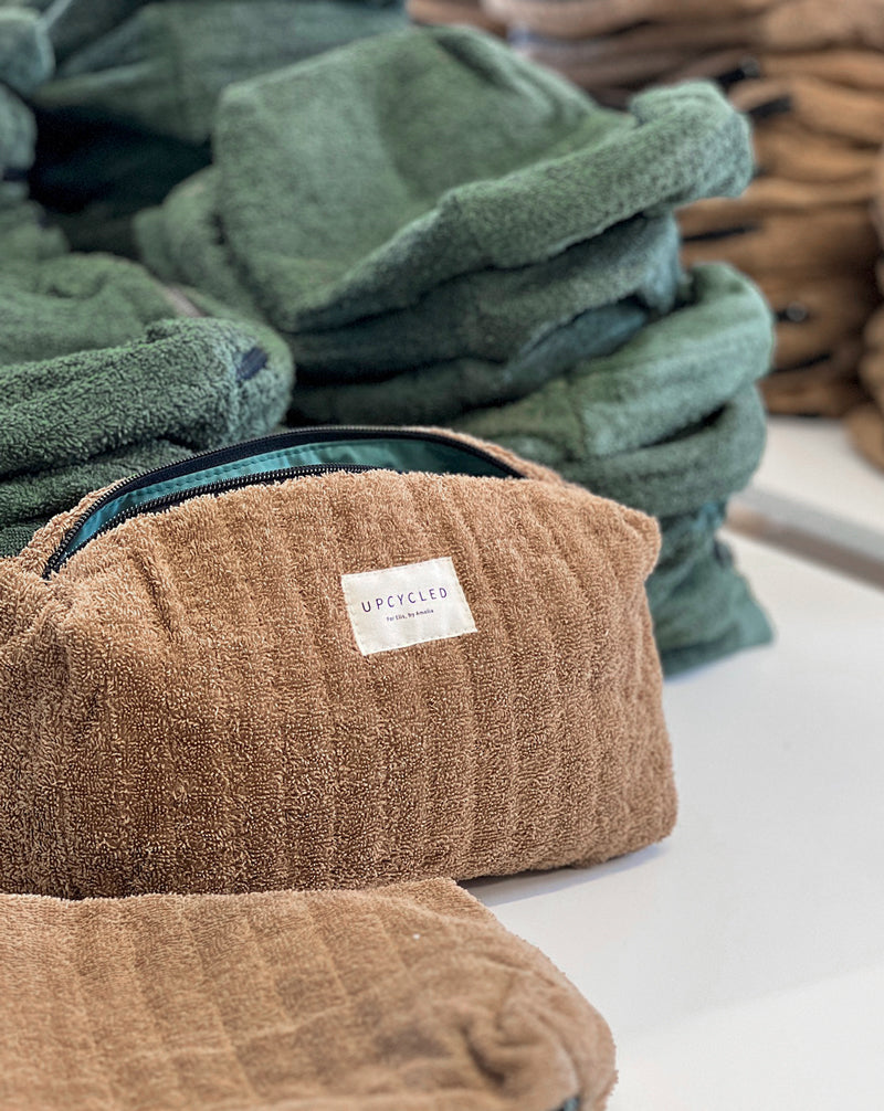 Toiletry bags made with discarded towels