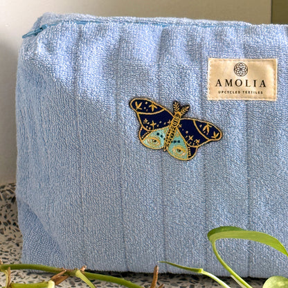 Upcycled toiletry bag, large, light blue with butterfly - limited edition