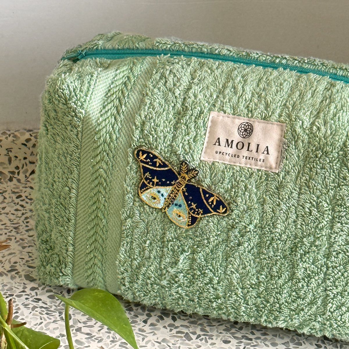 Upcycled toiletry bag, small, light green with butterfly - limited edition