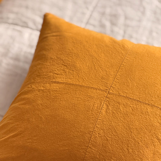 Set of three upcycled cushions, burnt orange, feather inners included