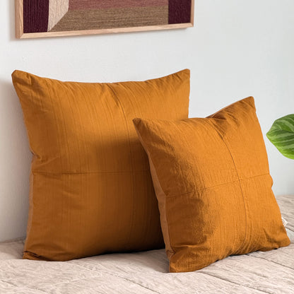 Set of two upcycled cushions, burnt orange stripes, feather inners included