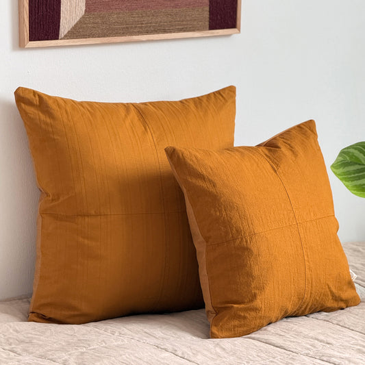 Set of two upcycled cushions, burnt orange stripes, feather inners included